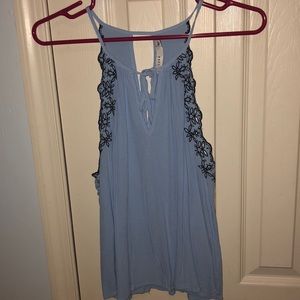 Loose fitting blue tank